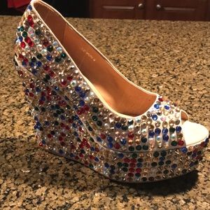 Multi colored studded wedges.